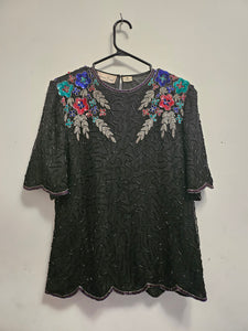 front view of 80s top with flower adorned beaded top