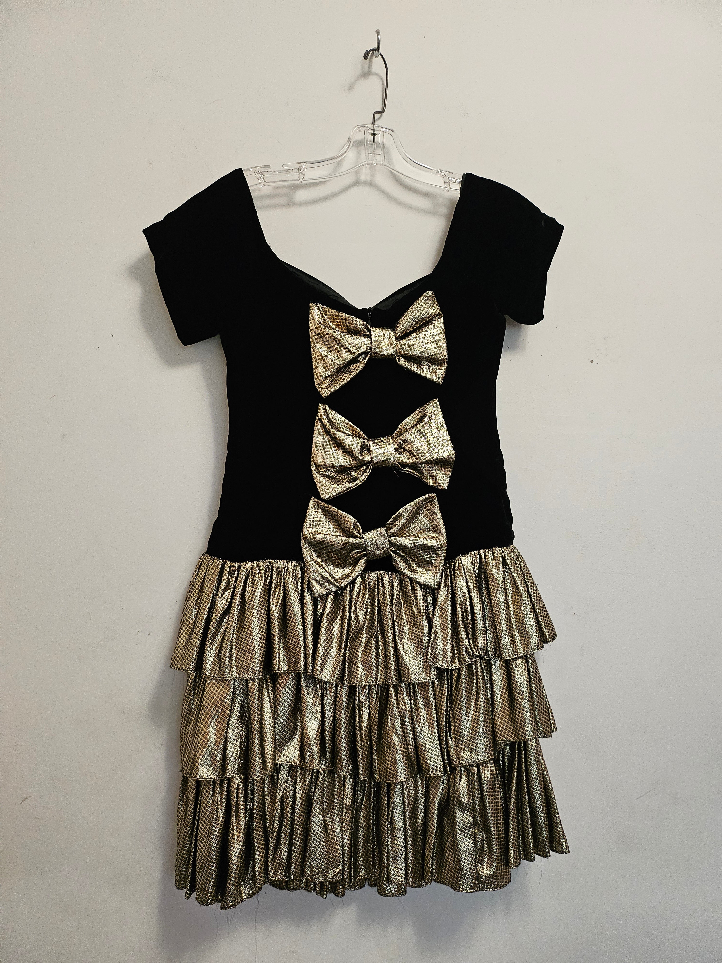 BOW BADDIE-Black and gold dress with triple bow details