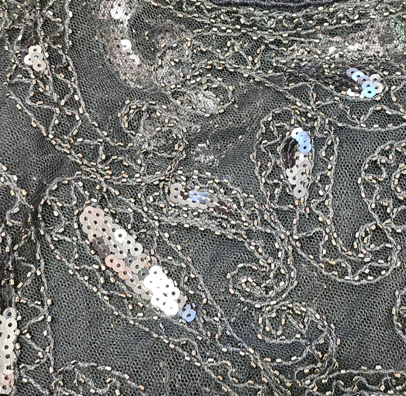 close up view of beading on Antique silver sequin beaded capelet shrug