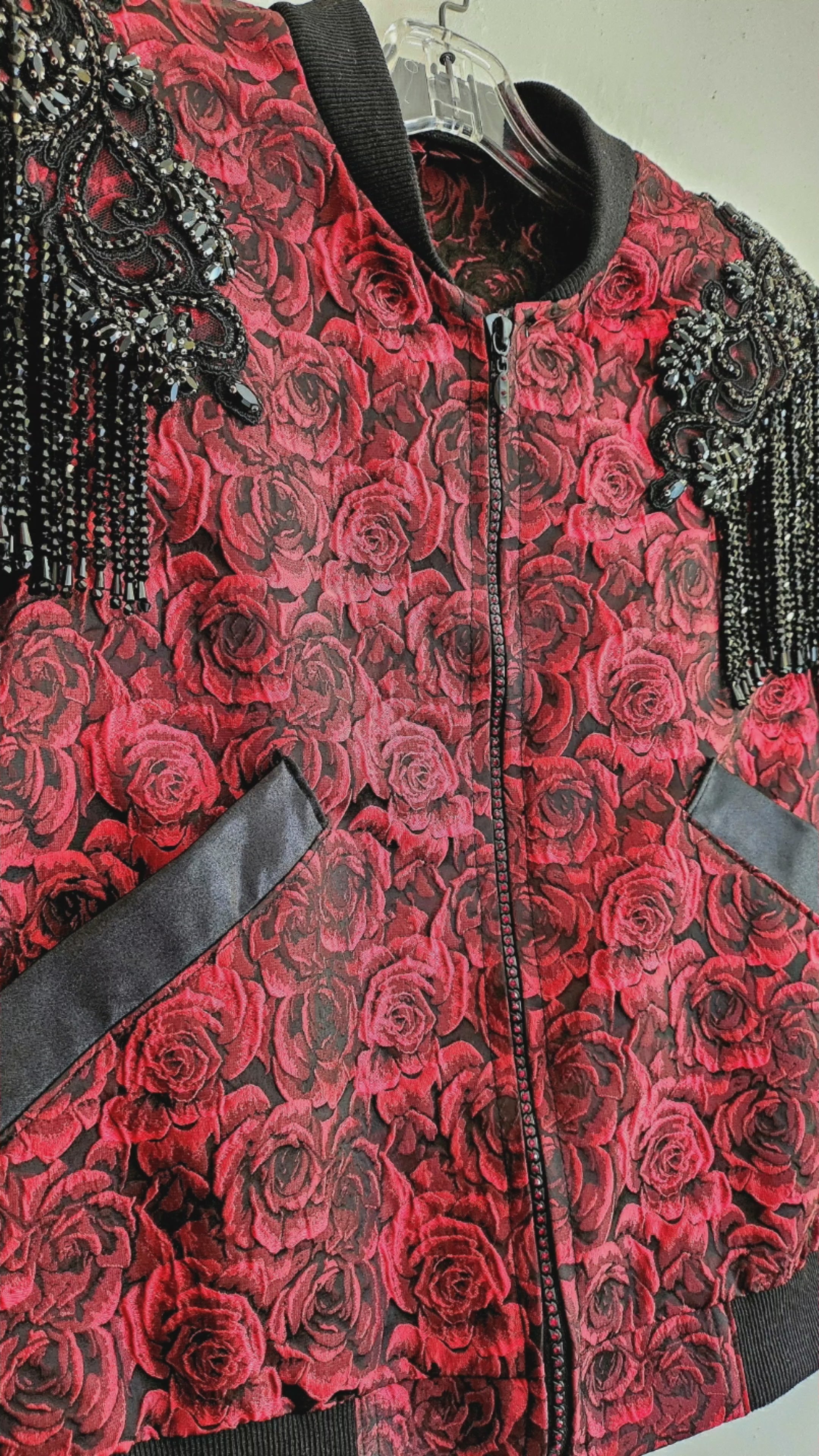  Video of Red rose brocade bomber jacket with rhinestone appliqued shoulders with beaded fringe.