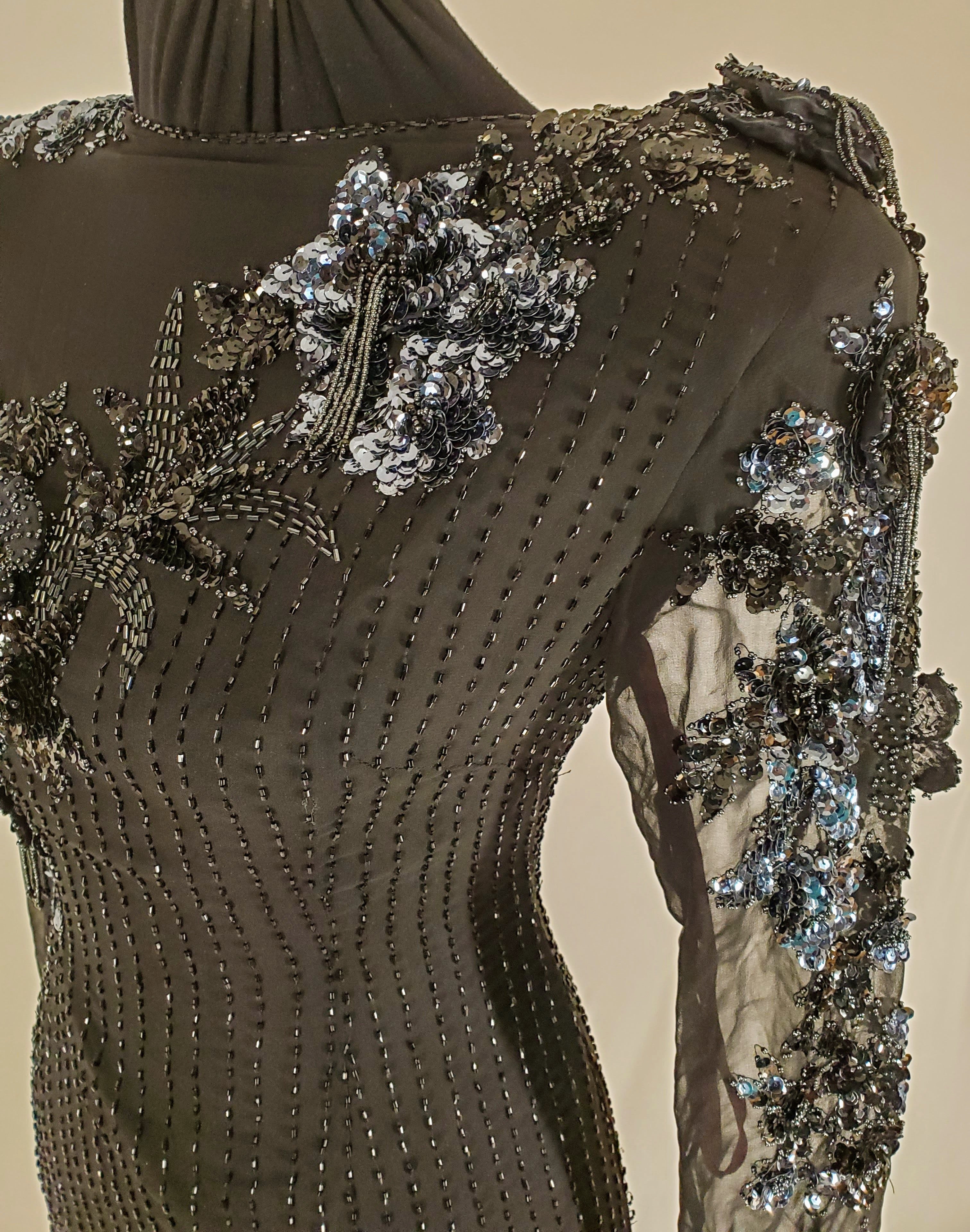 close up view of beading on sleeve ofVintage Black and Gunmetal Beaded Dress