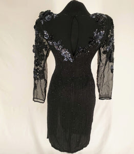 Back view of Vintage Black and Gunmetal Beaded Dress on mannequin